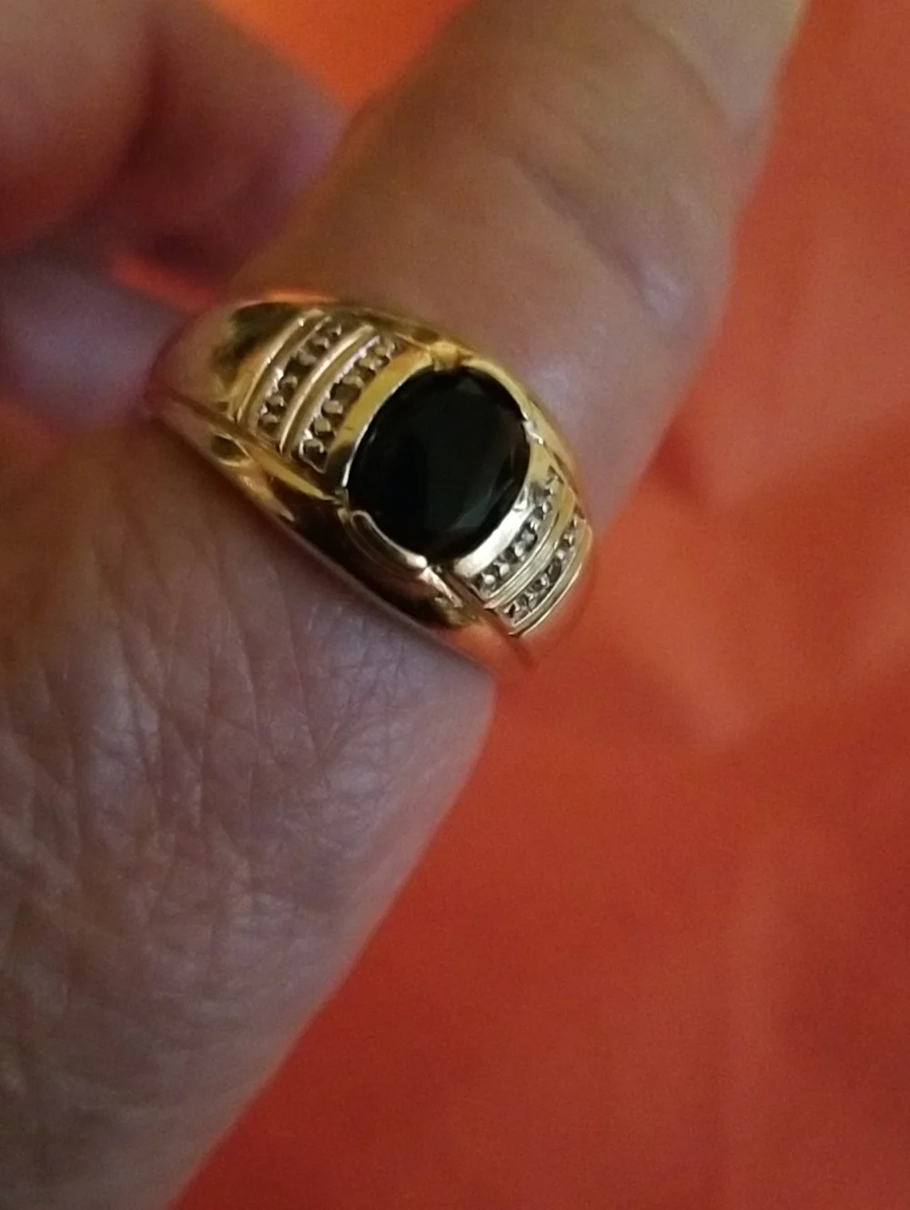 10K gold ring with Onyx and Diamonds